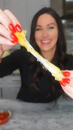 Pull-Apart Christmas Tree! Follow Chef Genevieve LaMonaca for 40 holiday recipes!🎄🧀 🧄✨ Not only a show-stopper but also SO easy and fun to make. With gooey mozzarella inside and buttery garlic goodness on top, it’s the ultimate holiday appetizer! 🎅🍞 Perfect for family gatherings, parties, or just a cozy night in—try it out and let me know how yours turns out! Recipe below. 💚 #HolidayRecipes #CheesyGoodness #FestiveBites #PullApartChristmasTree #CheeseStuffedChristmasTree Pull-Apart Cheese-