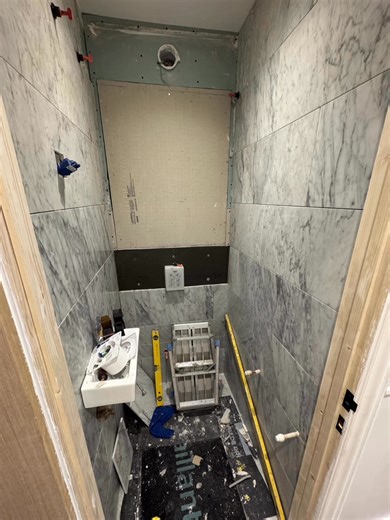 Full bathroom from start to finish. Tiled panel for hiding away the boiler 👍🏻 Real Marble tiles 😍 #W.C #Realmarble #accesspanel | Farmore Heating