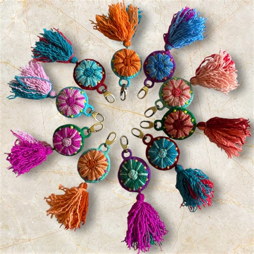 Kuyay Peruvian Designs | Elevate your holiday gifting with these unique, hand-embroidered keychains/ tassels, a vibrant accessory and a beautiful piece of wearable... | Instagram