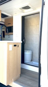 Take a peek at this stunning Beach House campervan by @customcraftedvans! 🌊✨ With its innovative bed lift system, refreshing indoor shower, and cozy dinette tucked beneath the bed, it perfectly balances style and functionality. Loving those minimalist vibes! 🏕️💚 Check out their page and let their campervan designs inspire you. #projectvanlife #luxuryvan #homeiswhereyouparkit #offgridliving #vanlife #vanlifebuilds #projectvanlife #campers #tinyhomes #sprintercampervans #smallhomes #interiordes