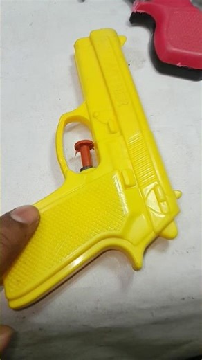 toy gun yellow