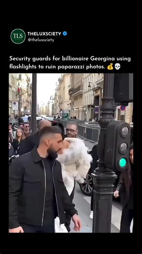 Business | Luxury | Classy on Instagram: "Billionaire Georgina Rodríguez, wife of Cristiano Ronaldo, has a rather peculiar "trick" to outsmart paparazzi: her bodyguards use strobe lights that flash directly at the cameras, ruining any photo. Interesting fact: these flashlights are calibrated to confuse the lens sensor, causing images to appear white, blurry, or unusable. Controversy: some call it arrogance, others genius. After all, when you live surrounded by cameras, the real luxury is having 