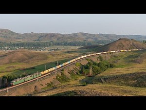 Russian Train Crossing the Meadow : Old Soviet locomotives
