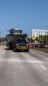 2.5M views · 54K reactions | Hauling the 60’ Midnight Express through downtown Miami  | Boats Gone Wild | Facebook