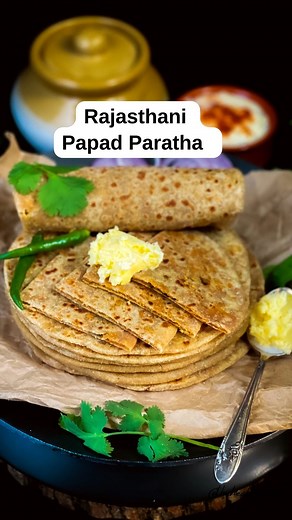 Ritu Khemka on Instagram: "Papad Paratha Have you ever tried this unique Rajasthani style papad stuffed paratha? This recipe comes from my grandma. She used to make this special paratha for me as a treat. It is such a mouthwatering, crunchy and delicious paratha recipe. If you love parathas do give it a try. This will surely spice up your meal! Recipe link in bio Follow @thehealthyrasoi for more #paratha #desibreakfast #thepla #papad #desikhana #flatbread #wholewheat #recipecreator #vegetarianre