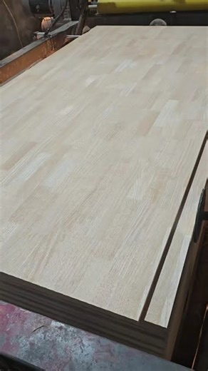 How is rubber wood produced?