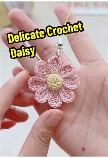 Learn how to crochet this adorable mini daisy step by step! This tiny flower can decorate clothes, bags, or be turned into cute charms. We use No. 3 pearl lace yarn and a 2.0 mm crochet hook in this beginner-friendly tutorial. Create your own beautiful crochet flowers and add a handmade touch to any accessory! #CrochetDaisy #MiniFlowerTutorial #CrochetForBeginners #HandmadeAccessories #DIYCrochet