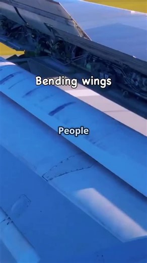 Jet.Nerd on Instagram: "Ever noticed airplane wings bending in flight? That’s not a problem… it’s genius engineering. ✈️ Wings are designed to flex, not stay stiff. When lift increases, the wings bend upward to absorb stress instead of breaking. Some wings can bend several meters without damage — especially during turbulence or takeoff. A rigid wing would snap. A flexible wing survives. If wings didn’t bend, airplanes wouldn’t fly safely. Next time you see wings flexing, remember: That bend is p