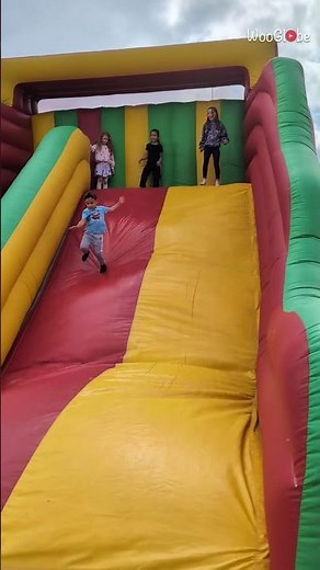 Inflatable Slide Fail: Little Boy's Wild Bouncing Adventure || WooGlobe