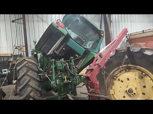 John Deere 6420 tipping the cab to fix a leak