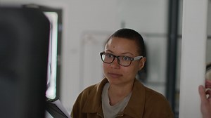 Free stock video - Woman in glasses looking at camera