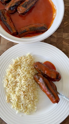 Syrian Sheikh El Mahshi Eggplant stuffed with lamb, cooked in a tomato sauce MAKES A SMALL POT - DOUBLE RECIPE FOR A FAMILY 1lb baby eggplants (the smallest you can find) 1/2 lb ground lamb or beef 1/2 tsp salt 1/4 tsp pepper Olive oil for brushing Tomato sauce: 1 cup passata 2 cups water 1/2 tsp salt (to taste) 1/4 tsp black pepper Garlic yogurt: 1 cup plain yogurt 1 small garlic clove, crated 1/2 tsp salt (to taste) Serve with: vermicelli rice Garnish: Toasted Almonds Chopped parsley Cut the t
