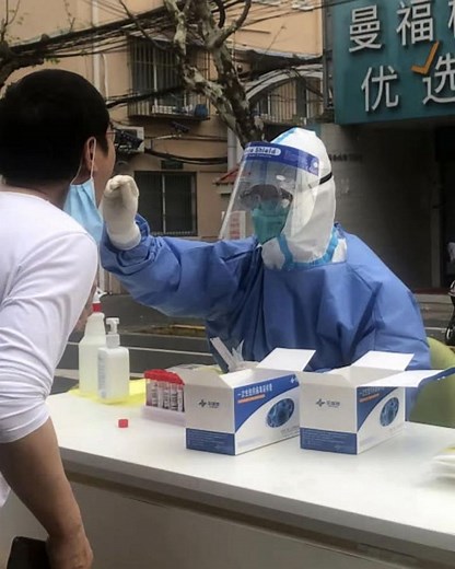 Shanghai residents face food shortages, late-night testing in lockdown