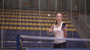 Table tennis, a woman player hits the ball with a racket. woman dropped table tennis ball.slow motion video. High quality Full HD video recording