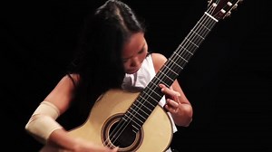 8.2K views · 284 reactions | Thu Le plays Vals for Atom composed by @Laurent Boutros. Credit to Bahrain sessions for the video production. Do check out their FB page & YouTube Channel https://www.youtube.com/channel/UCXnW6JNIH-QiX9i6--BLzPA | Classical Guitar Asia | Facebook