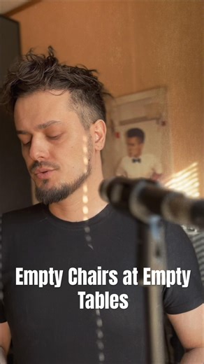 Empty chairs at empty tables | Les Miserables cover