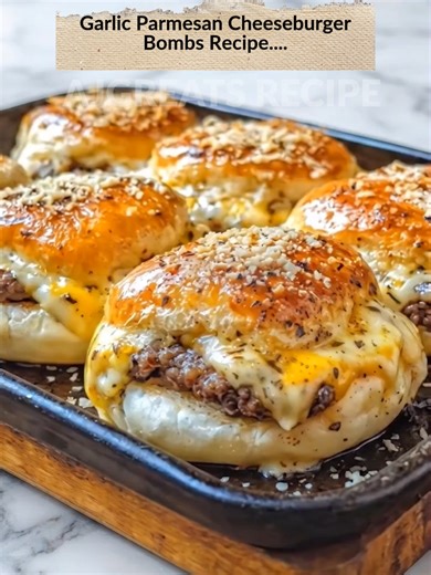 Garlic Parmesan Cheeseburger Bombs Soft, golden bread rolls stuffed with juicy seasoned beef and melty cheese, brushed with garlic butter and Parmesan—irresistible bite-size comfort food. 😍 Full recipe is on my page— right under my profile picture ⬆️