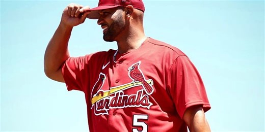 Pujols singles in return to diamond with Cards