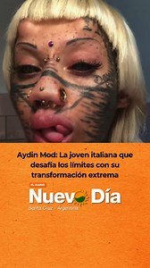 🧬 UNA “GATA ZOMBI” QUE DESAFÍA LOS LÍMITES Aydin Mod, una joven italiana de 23 años, se sometió a más de 30 modificaciones corporales para convertirse en una “gata humana zombi”. Eliminación de nariz, ombligo y pezones, bifurcación de la lengua, cuernos, tatuajes oculares y más: todo forma parte de su identidad. 🎭 En TikTok, donde suma más de 300 mil seguidores y mas de 50 millones de reproducciones en sus videos, comparte su impactante transformación y una filosofía personal basada en desafia