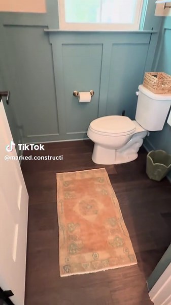 Transform Your Powder Room with Stylish Teal Wainscoting