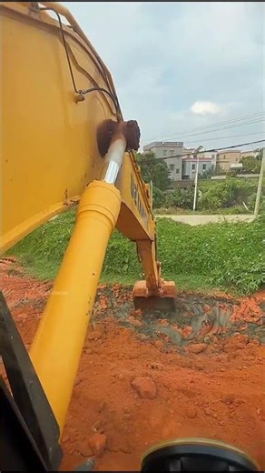 Excavators Load Soil Onto Trucks