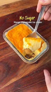 No sugar Mango cheesecake ice cream ghorote hohoje bonaok okol 3ta bosture Ingredients: Hung curd – ½ cup Amul fresh cream – ½ cup Mango – 1 (chopped or pureed) Honey – 2 tablespoons Marie Gold biscuits – crushed in a mixer Butter – to mix with the crushed biscuits Mango puree – for layer Procedure: Mix crushed Marie Gold biscuits with melted butter and set as the base.In a bowl, mix hung curd, Amul fresh cream, chopped mango, and honey.Layer the biscuit base, and top with mango puree. Freeze in