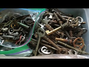 Selling the gold watch looking Through antique keys Getting ready for the flea market blue Bus Dave