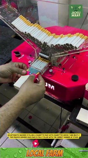 An automatic machine fills a cigarette pack with cigarettes quickly and neatly.