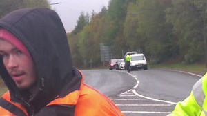 Nuclear convoy on it's way into Coulport after passing through Glasgow at midday 08/05/21. 4 warhead carriers and out of shot broken down police apc. Video of this in comments. | Faslane Peace Camp