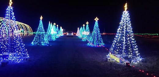 Join the tradition at the Santa's Rock N Lights Drive Thru Light Experience. Come see your favorite installations and brand new displays such as our larger-than-life 3D reindeer and over 700' of dancing tunnels. Tickets on sale now! | Santa's Rock n Lights