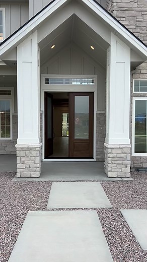 Can you imagine walking through your front door to this? Bathed in natural light, the grand staircase, the warm wood tones — it’s just so good. ✨ Another stunning Highland Home where every detail welcomes you in. | Highland Homes