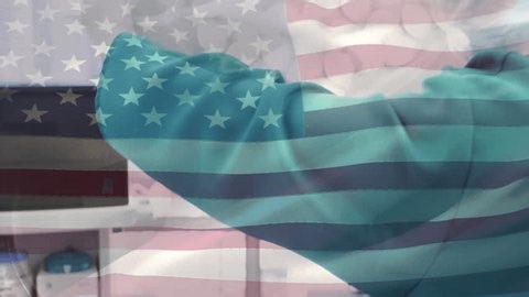 clip-3999475459-surgeon-adjusting-surgical-light-operating-room-hospital