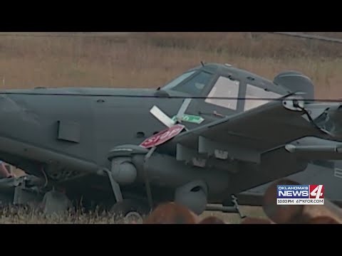 2 people escape injury after Air Force plane crashes in field