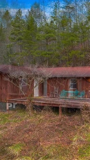 Discover your own private mountain retreat with this extraordinary 50.54-acre estate in the heart of Cosby, Tennessee. Surrounded by the breathtaking beauty of the Great Smoky Mountains, this rare and versatile property offers an unmatched blend of natural serenity, privacy, and opportunity—perfect for a peaceful escape, a spacious homestead, or a lucrative investment. | Old House