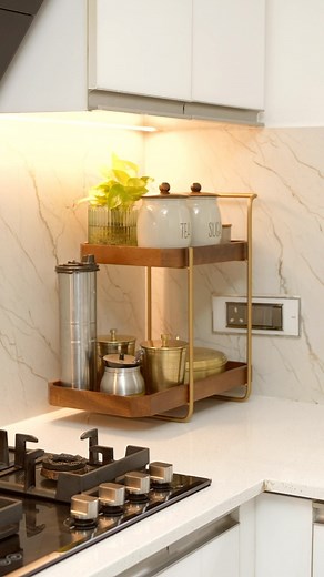 Ashu Khatter on Instagram: "Sharing some beautiful and functional kitchen products to help organize your countertop 😊 ⭐️ I found this square spice box very smart and practical. Made from high-quality, rust-free steel, it comes with 9 large, deep compartments, perfect for storing both powdered and whole spices together. The transparent lid adds a modern touch, making it stylish and functional. ⭐️ The aluminium foil cutter and organizer is a perfect solution for keeping food wraps, foil and paper