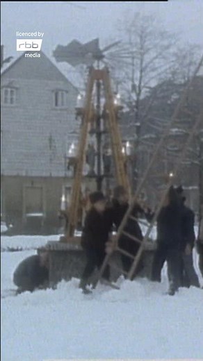 East Germany, Ore Mountains, 1978 | Erection of a traditional rotating pyramid
