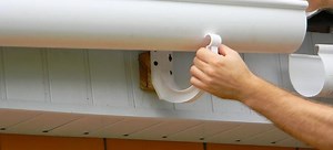 How to Install New Gutters | DoItYourself.com