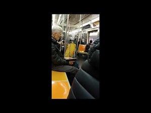 IDIOT pulls EMERGENCY BRAKE on NYC Subway and almost gets a beating!