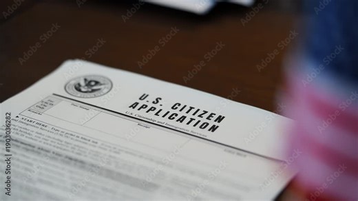 Visa application form with red denied stamp, immigration rejection concept, travel restriction and documentation issue.