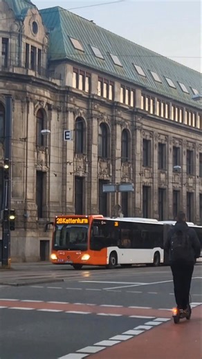 Tram Passing by Historic Building in Bremen