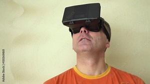 Middle age Man Experiencing Virtual Reality - 360 Movie VR Video 3D - New Immersive Technology