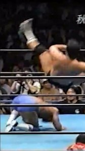 Omori's determined flying knee kick fails to launch. September 4, 1999, Nippon Budokan, Jun Akiya...