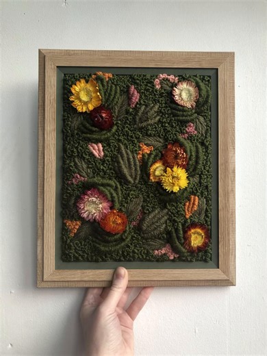 This one of a kind art piece created using hand embroidery and real dried flowers in a hand painted dark green frame #art #fyp #embroidery #originalart #homedecor