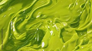 Abstract green paint texture creating a dynamic and vibrant visual background