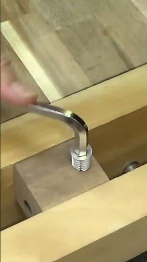The following is the process of making threads on a wooden block using simple tools.