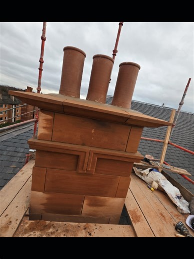 Rebuilding a Stone Chimney Cap with New Pots