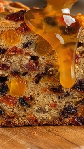 This old-fashioned fruit cake is the kind that stays moist, rich, and sliceable for days—packed with plump dried fruit, crunchy nuts, and warm spices that make the whole kitchen smell like the holidays. It’s a family recipe that gets better every day it rests. Save this Gooey Fruit Cake Recipe and tag the person who still believes a good fruit cake can be incredible. Yield: 1 loaf (9×5-inch pan, 10–12 slices) Ingredients (U.S. pantry staples) 2 cups mixed dried fruit, chopped 1 cup chopped nuts 