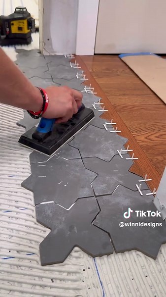 Installing this Beautiful Tile #construction #diy #realestate #homerenovation #entrepreneur