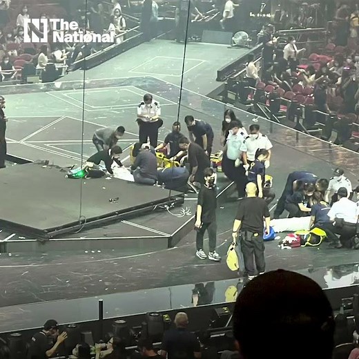 Huge screen crushes dancers at boy band concert
