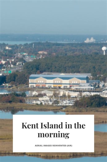 Kent Island in the morning Start your day with "Kent Island in the Morning," taken in the fall of 2022 as one of my first drone photos. This shot looks west from Grasonville, MD, with the Kent Narrows Bridge in the foreground and the Chesapeake Bay Bridge stretching across the background. Hidden behind the Kent Narrows Bridge is the Waterman’s Memorial Bridge, once the original drawbridge and now part of Route 18. The soft morning light glides over the marshes and marinas, blending wetlands with